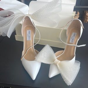 White pointed toe heels